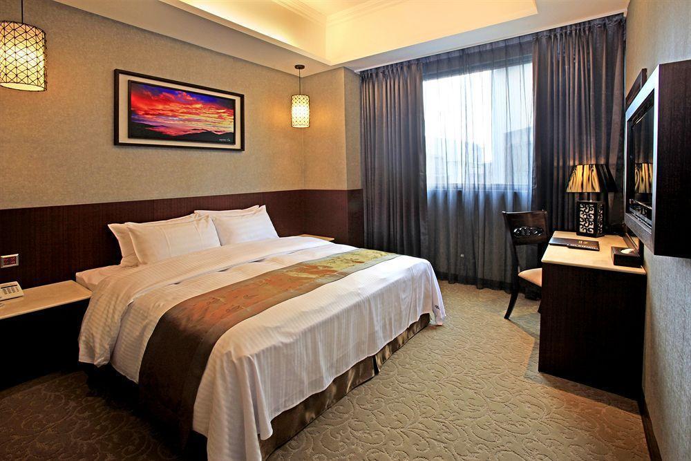 Guanko Hotel Цзяи Экстерьер фото