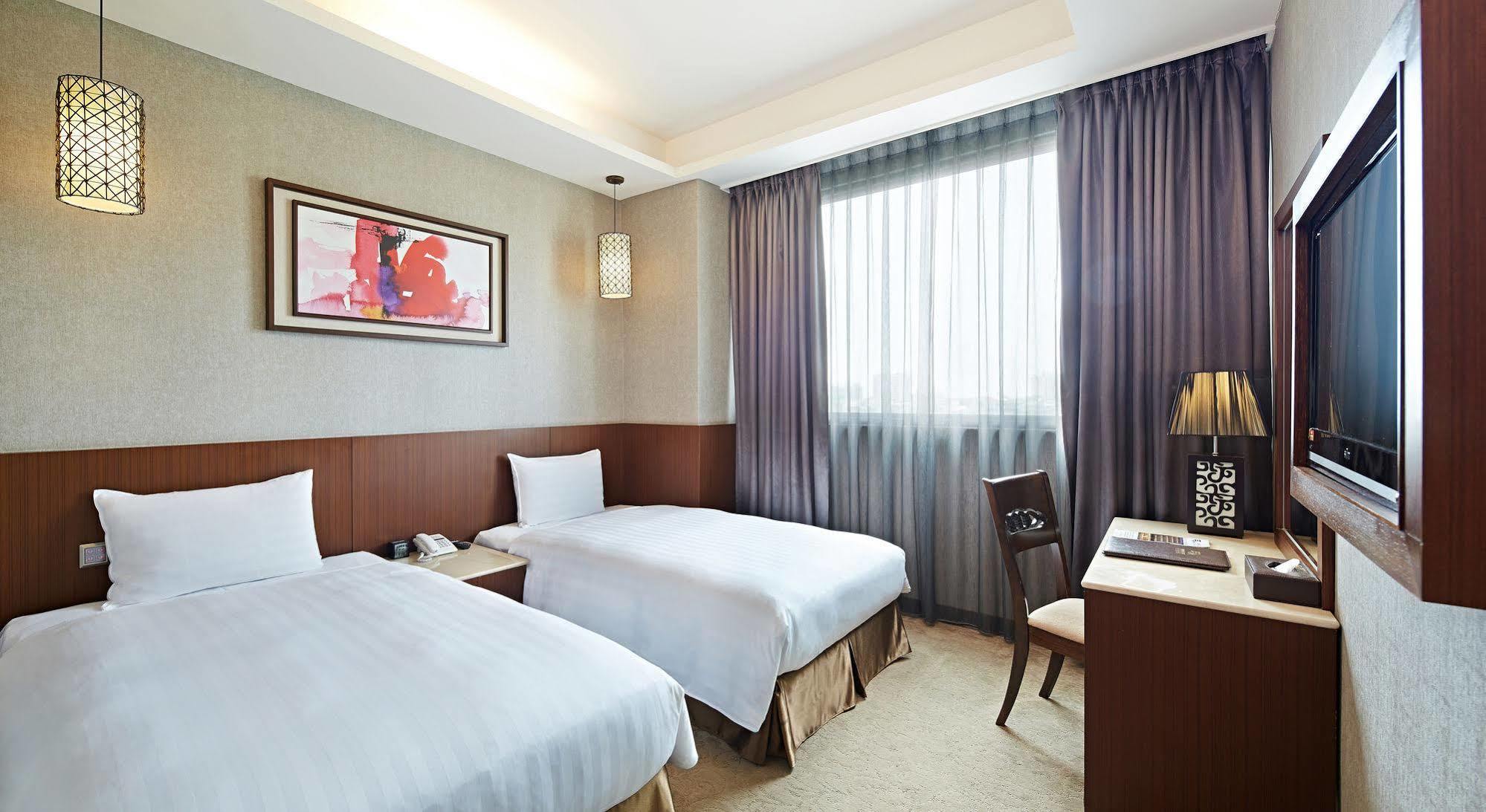 Guanko Hotel Цзяи Экстерьер фото